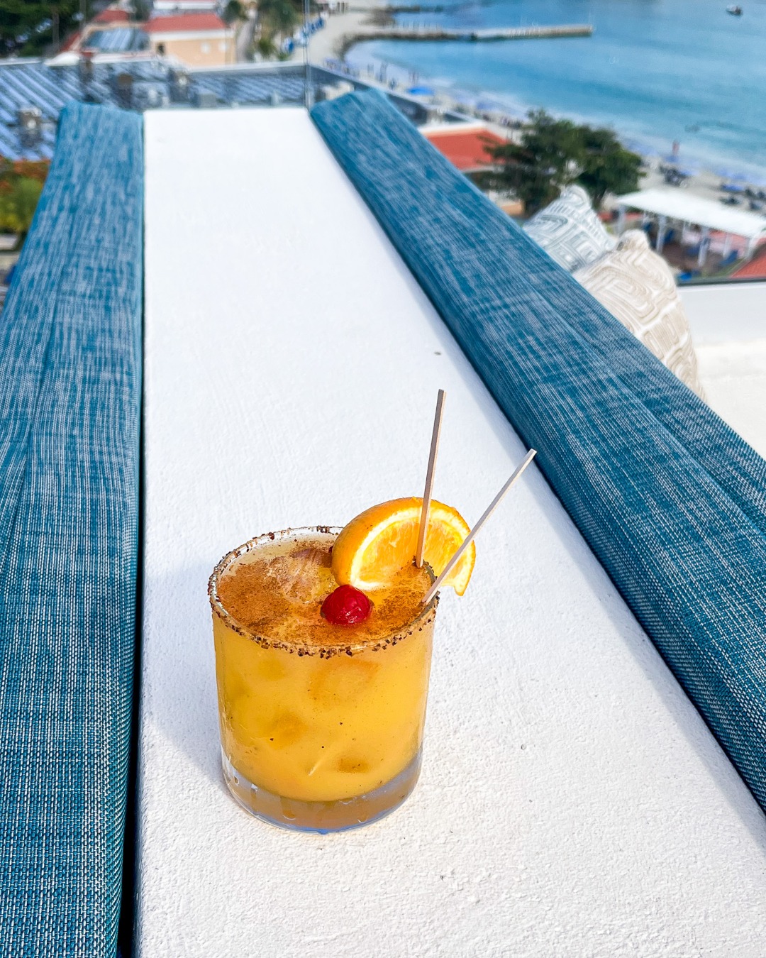 B Positive cocktail with chili tincture garnish at Mix at Oceans