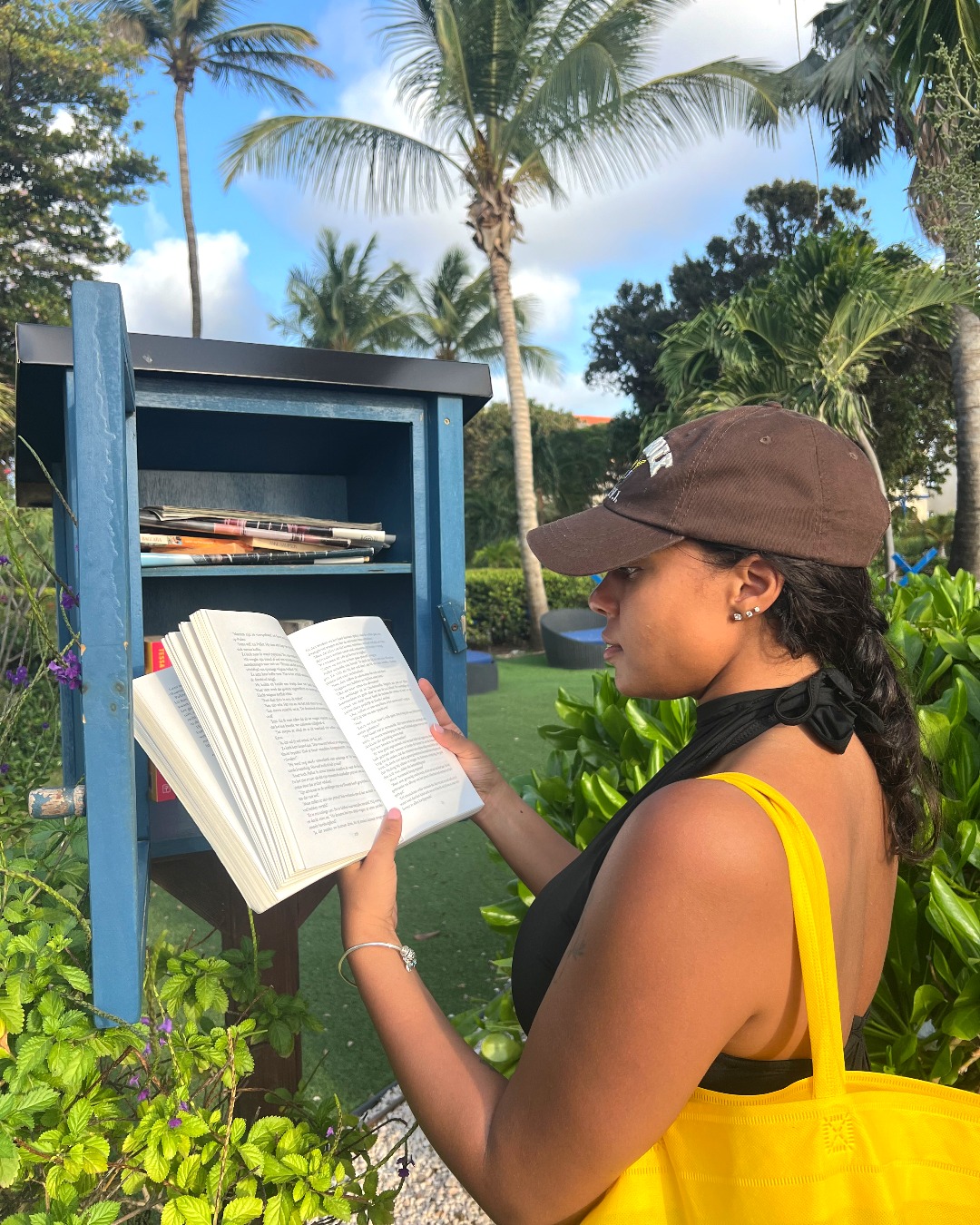 Reading by the water at Divi Resorts